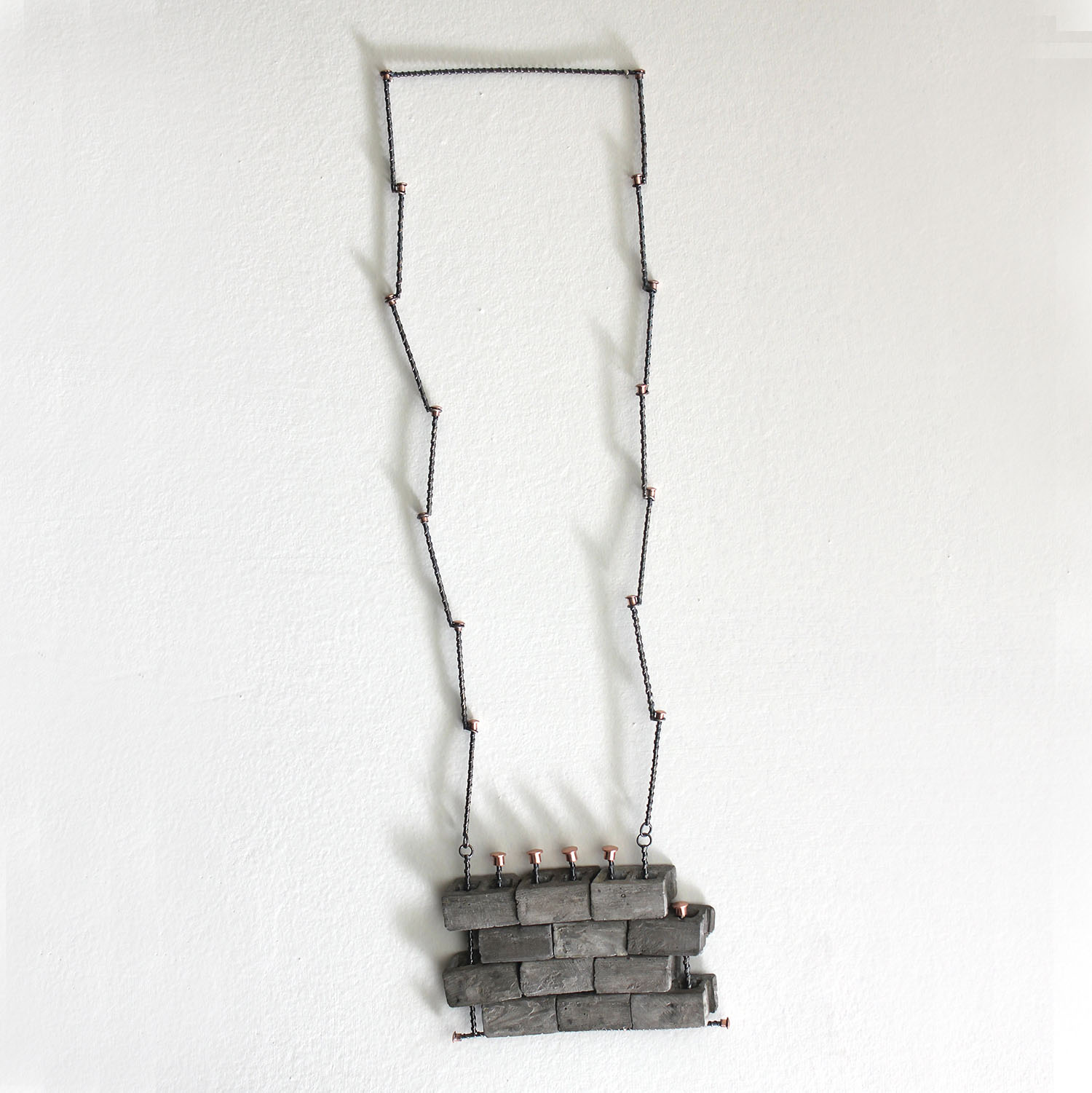 cinder building blocks necklace by Natalie Macellaio