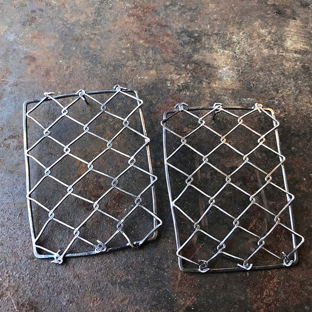 construction jewelry chain link fence earrings by Natalie Macellaio