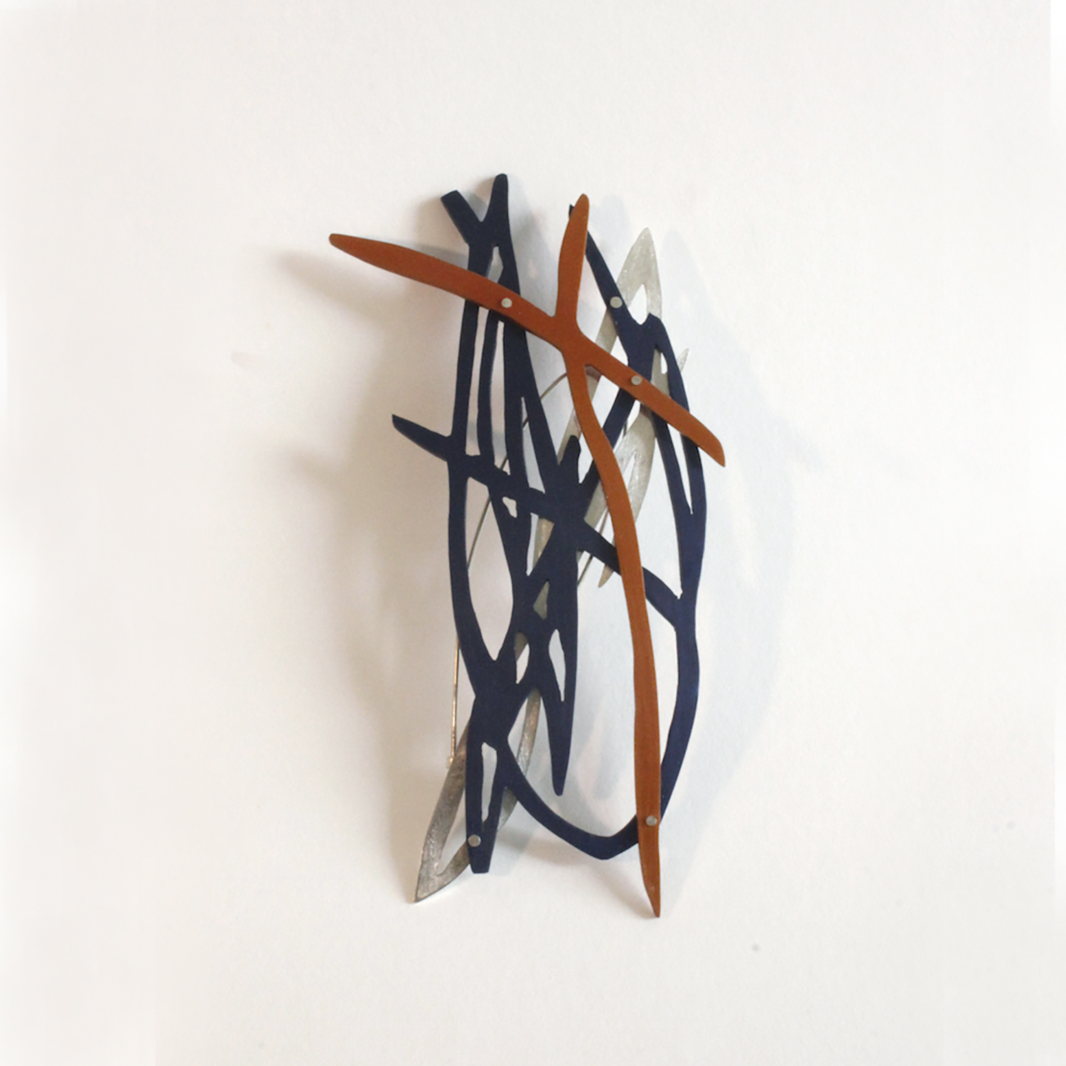 navy orange scribble brooch by Natalie Macellaio