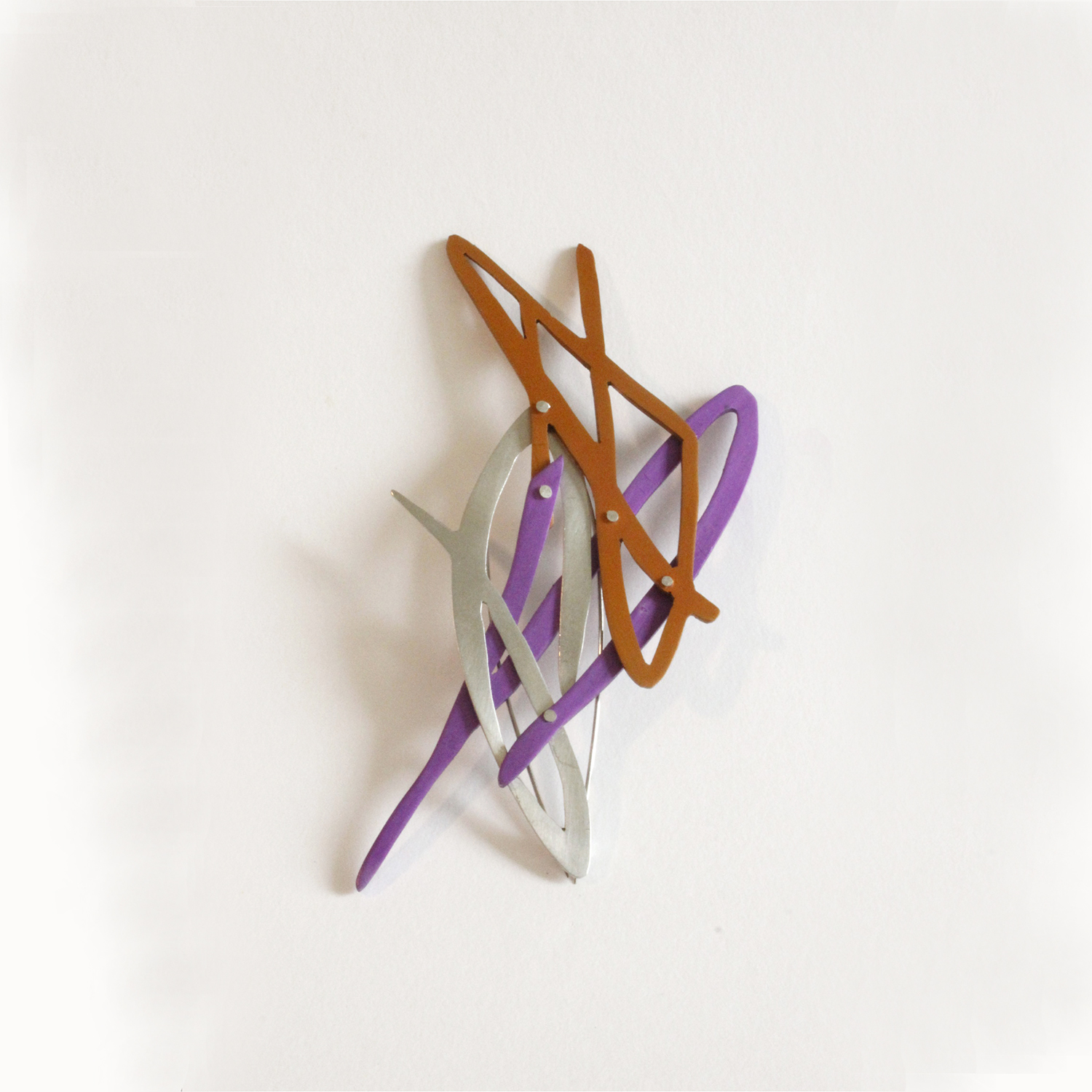 orange purple scribble brooch by Natalie Macellaio